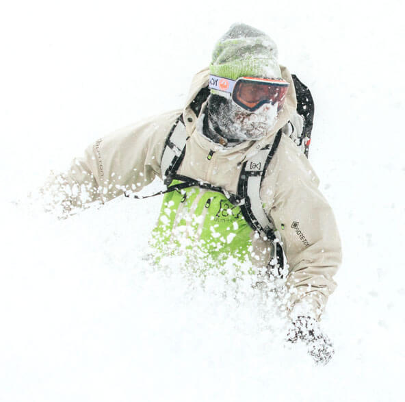 Snowboarder in powder snow